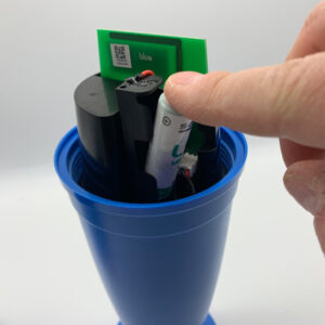 Battery compartment extension - compatible with Blue Connect pool tester - inserting the battery